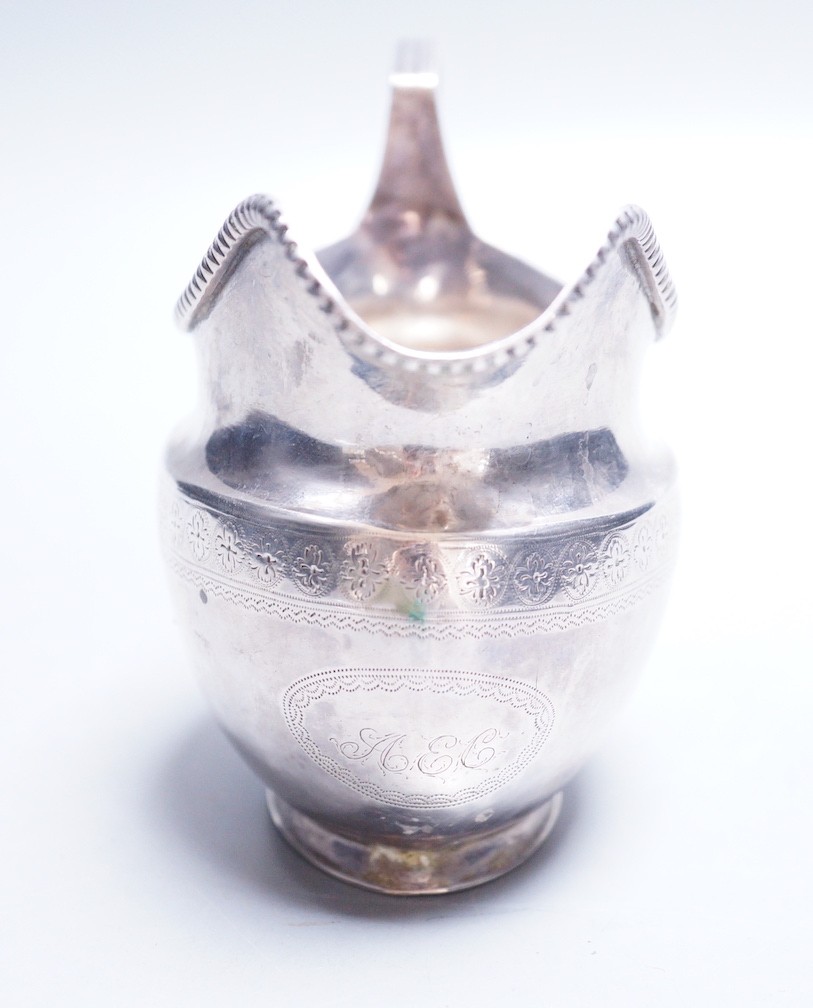 A George III silver cream jug, Thomas Law, Sheffield, 1808, height 9.8cm, 122 grams.